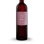 Bottle of red wine with a customized pink label printed with a floral design and the text Chateau de Kelly Limited Edition to give as a gift
