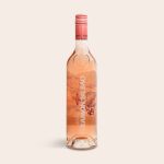 Bottle of Ramon Bilbao rosé with an illustrated label featuring a hot air balloon, ready to be presented in an engraved case.