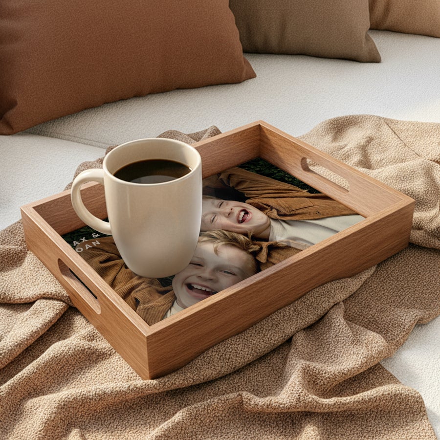 Personalised wooden serving tray - Beige - 33 x 20 cm, printed with a photo of two smiling children and the names Max & Joan, holding a coffee mug on a cozy blanket.