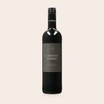 Maison de la Surprise Cabernet Sauvignon wine with a personalized label featuring Chateau Harris text and an octopus illustration