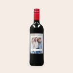 Oude Kaap red wine bottle with a custom-made label printed with a photo of three women and the text Cheers to Friendship