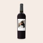 Bottle of Riondo Merlot wine with a personalized label, printed with a photo of a couple and names Matthew & Emily