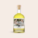 A personalised limoncello bottle with a custom photo label showing a couple and the text Marcus London Blend