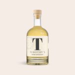 Personalized whisky bottle with a "T" and "Timothy's Premium Whisky" on a custom label